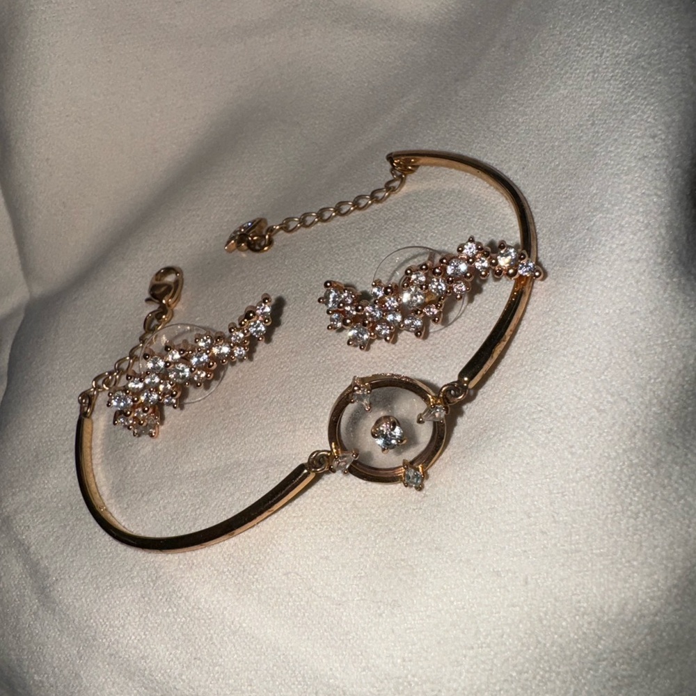 Swarovski rose gold bracelet and earrings set